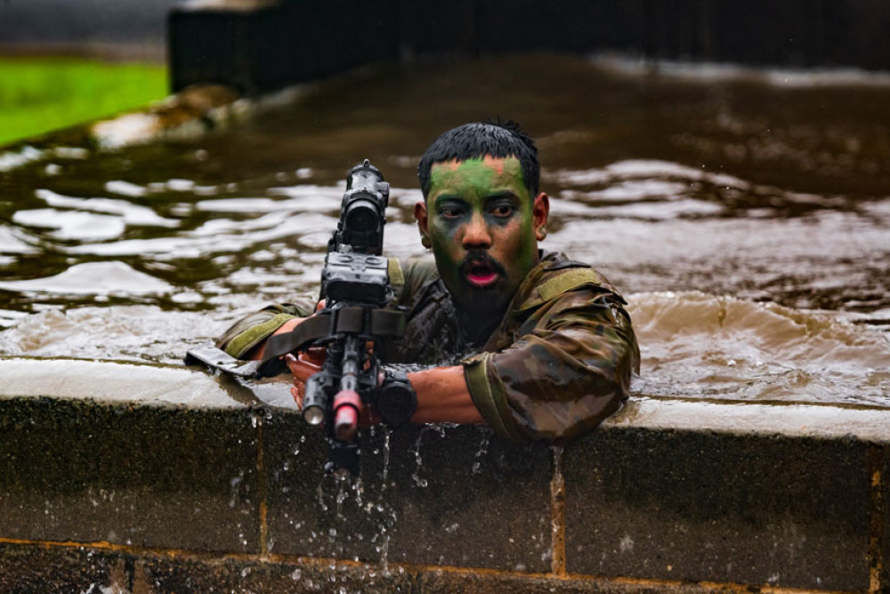 Soldiers from the Australian Army’s 5th/7th Battalion Royal Australian Regiment and French troops from the New Caledonian Armed Forces, conduct Exercise True Grit at Tully. Picture: Corporal Madhur Chitnis
